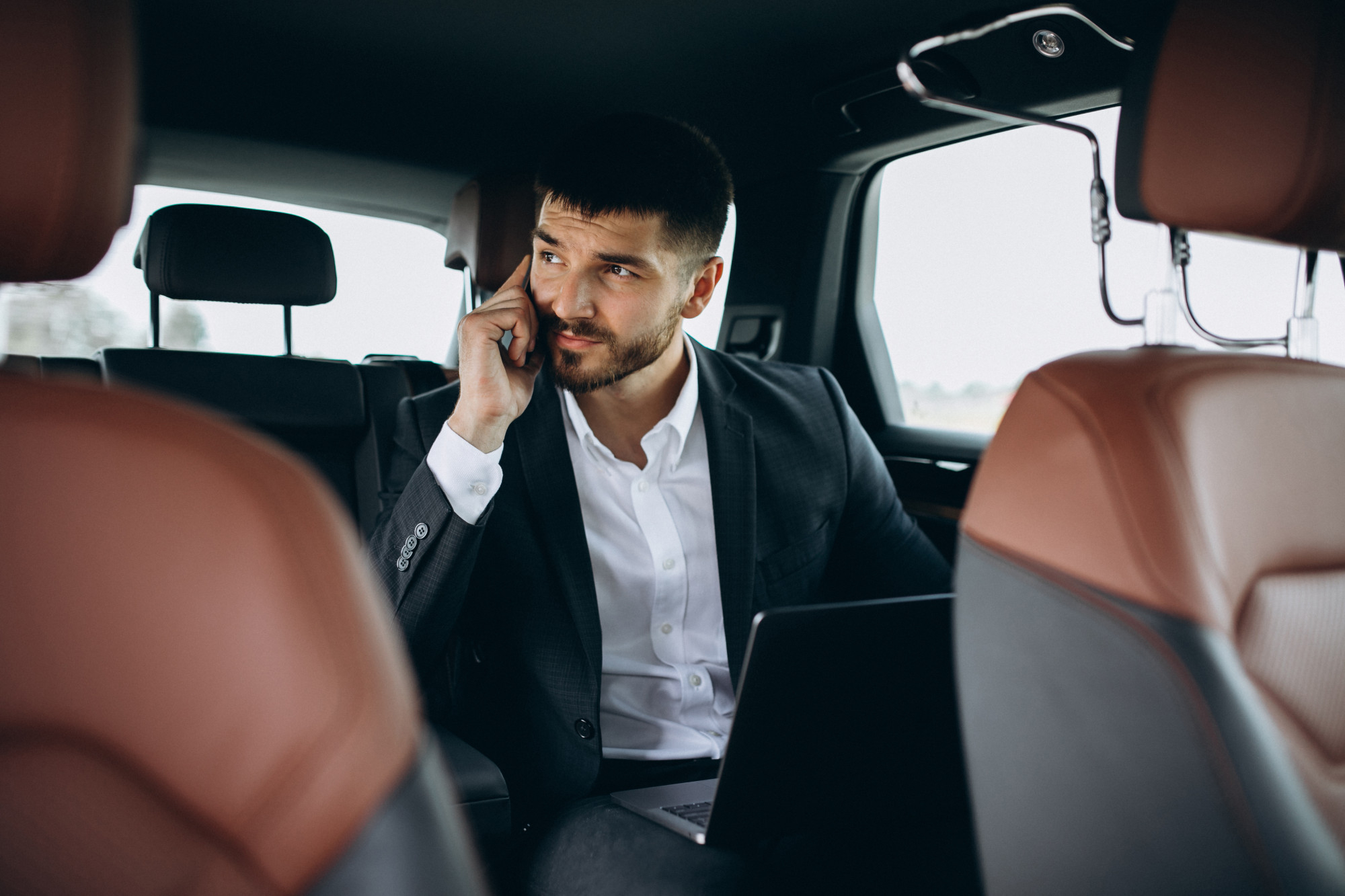  inside a Tacoma black car rental